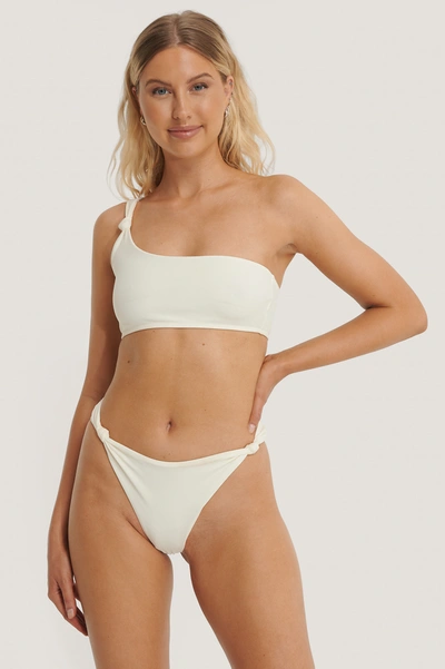 Shop Danaë X Na-kd One Shoulder Knot Detail Bikini Top Offwhite In Light Beige