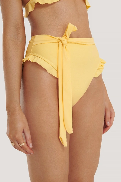 Shop Na-kd Flounce Detail Highwaist Bikini Panty Yellow In Light Yellow