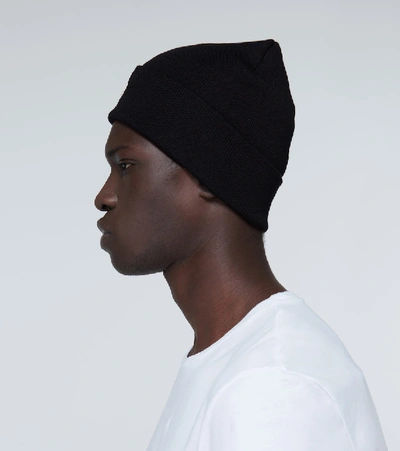 Shop Moncler Knitted Wool Beanie In Black