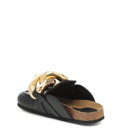 Shop Jw Anderson Embellished Leather Slippers In Black