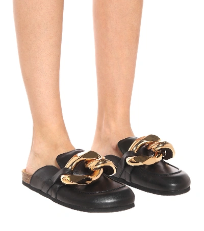 Shop Jw Anderson Embellished Leather Slippers In Black