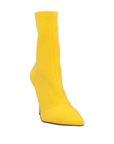 Shop Naked Wolfe Ankle Boots In Yellow