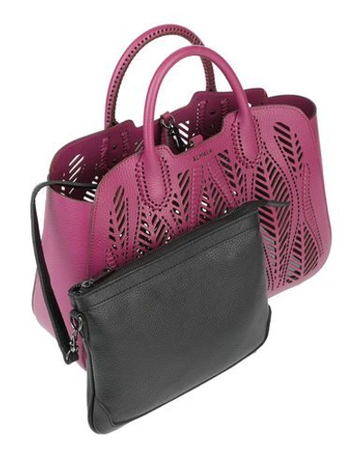 Shop Almala Handbags In Light Purple
