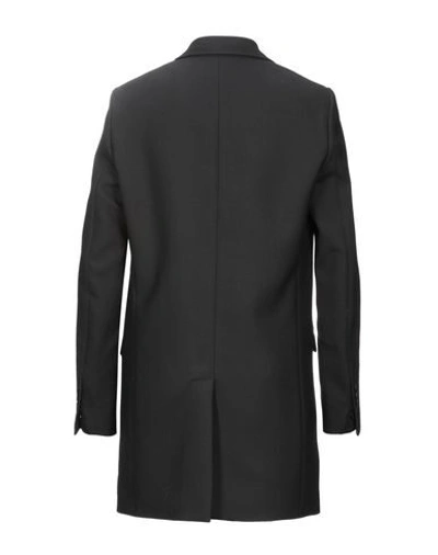 Shop Alessandro Dell'acqua Coats In Black