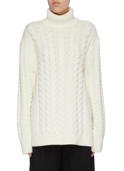 Shop Tibi Buckle Cutout Back Cable Knit Turtleneck Sweater In White