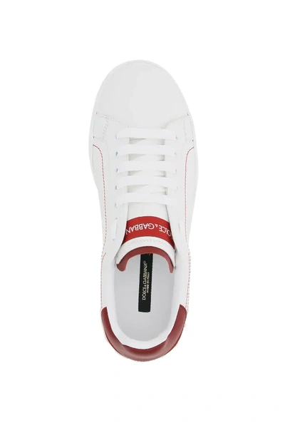Shop Dolce & Gabbana Portofino Leather Sneakers In White,red