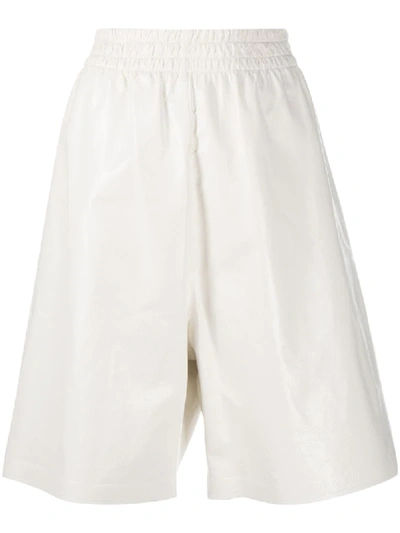 Shop Bottega Veneta Patent Leather Shorts In White