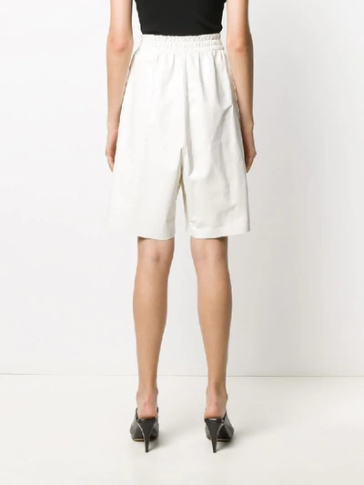 Shop Bottega Veneta Patent Leather Shorts In White