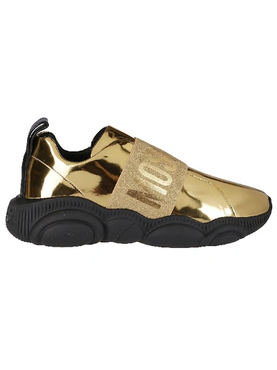 Shop Moschino Gold Leather Teddy Sneakers
