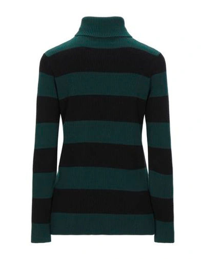 Shop Ganni Turtlenecks In Dark Green