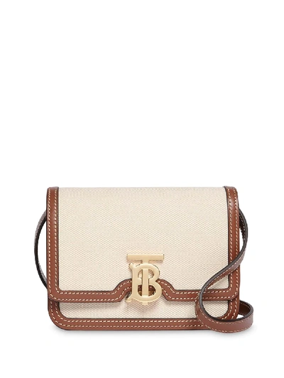 Shop Burberry Mini Two-tone Canvas And Leather Tb Bag In White