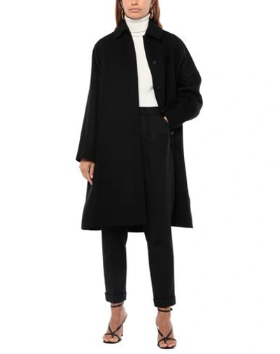 Shop Alaïa Coats In Black