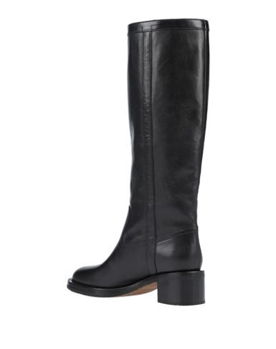 Shop Celine Boots In Black