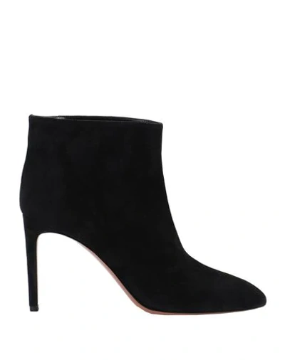 Shop Alaïa Ankle Boot In Black
