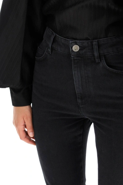 Shop Attico Flared Jeans In Black
