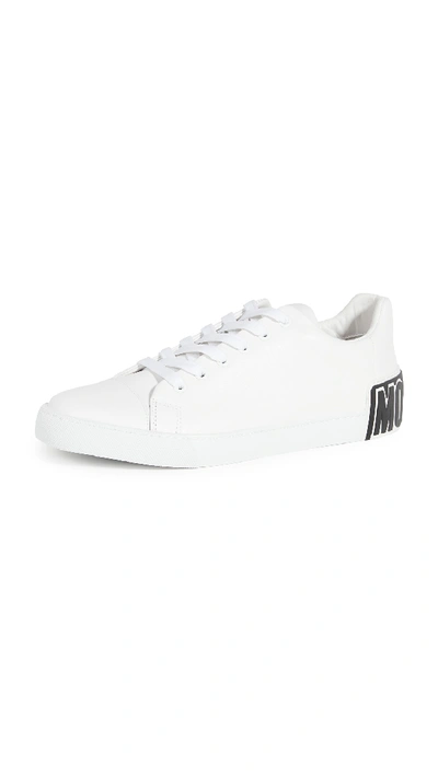 Shop Moschino Logo Sneakers In White