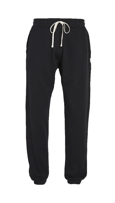 Shop Reigning Champ Midweight Terry Cuffed Sweatpants Black