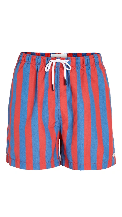 Shop Solid & Striped The Classic Striped Swim Trunks In Red/navy Stripe