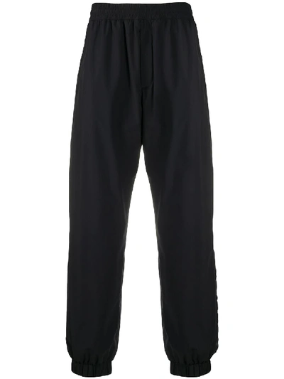 Shop Moncler Loose-fit Track Pants In Black