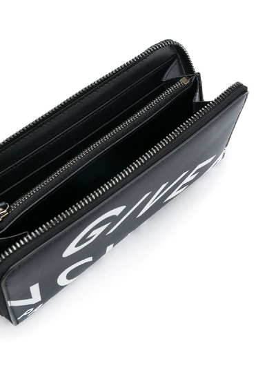 Shop Givenchy Large Zipped Leather Wallet In Black