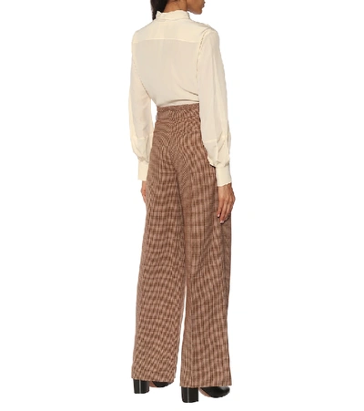 Shop Chloé Checked Wool Flared Pants In Brown
