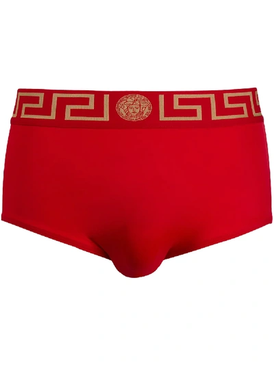 Shop Versace Greca-print Swimming Trunks In Red