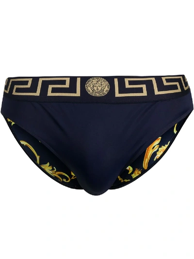 Shop Versace Greca-print Swimming Trunks In Blue