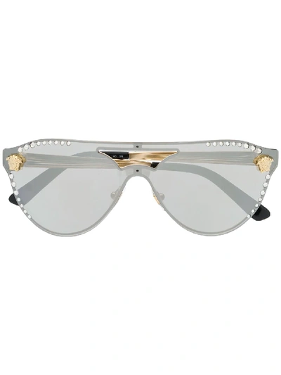 Shop Versace Cat-eye Frame Sunglasses In Gold