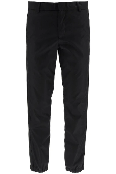 Shop Prada Logo Elasticated Cuff Trousers In Black