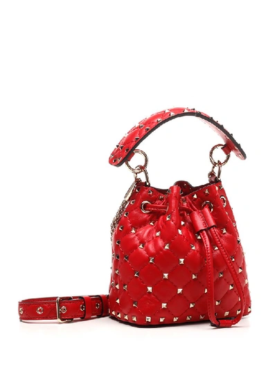 Shop Valentino Garavani Rockstud Bucket Bag In Red