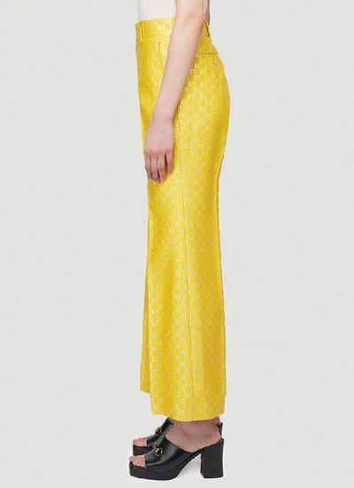 Shop Gucci Gg Lamé Wide Pants In Yellow