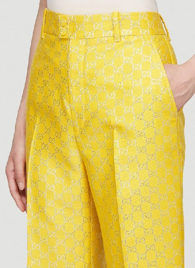 Shop Gucci Gg Lamé Wide Pants In Yellow