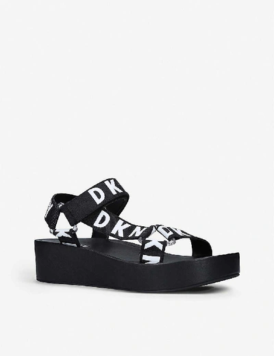 Shop Dkny Ayli Brand-print Woven Wedge Sandals In Black