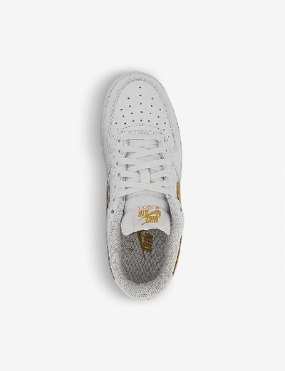 Shop Nike Air Force 1 Lv8 Leather Trainers In White+club+gold+white