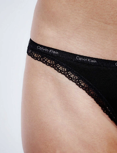 Shop Calvin Klein Bottoms Up Jersey Thong In Black