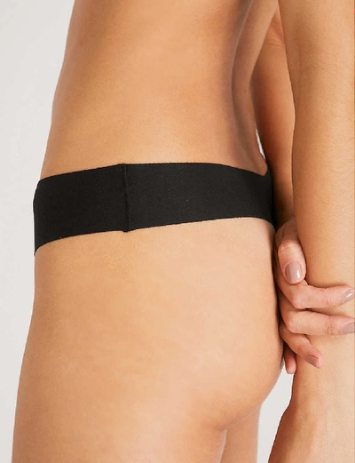 Shop Commando Stretch-cotton Thong In Black