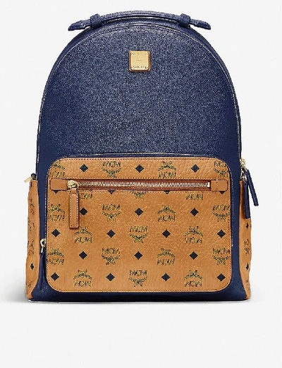 Shop Mcm Stark Brand-print Medium Coated-canvas Backpack In Dark Sapphire