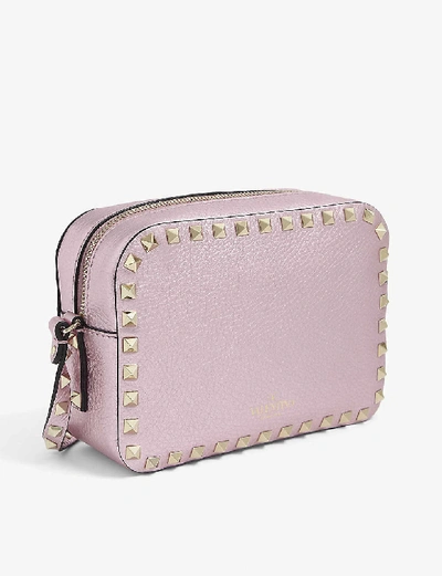Shop Valentino Rockstud Leather Cross-body Camera Bag In Metallic Pink