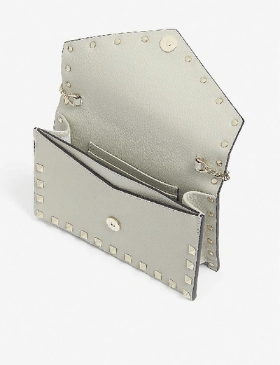 Shop Valentino Rockstud Leather Envelope Clutch In Opal Grey