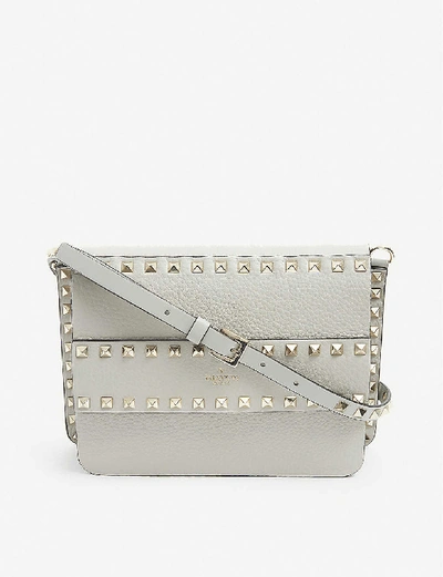 Shop Valentino Rockstud Leather Cross-body Bag In Opal Grey