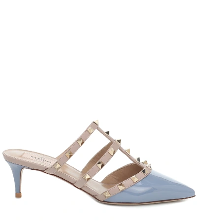 Shop Valentino Rockstud Patent Leather Mules In Blue