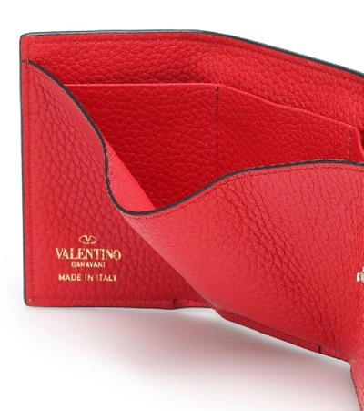 Shop Valentino Rockstud Mini Leather Wallet In Red