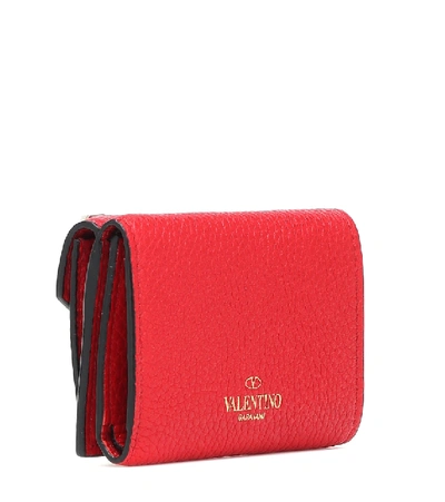 Shop Valentino Rockstud Mini Leather Wallet In Red
