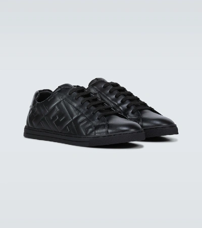 Shop Fendi Embossed Leather Sneakers In Black