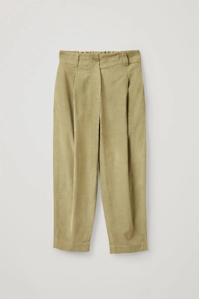 Shop Cos Cotton Wide-leg Pleated Cord Trousers In Green