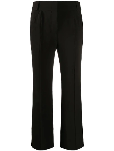 Shop Fendi Crease-detailing Flared Trousers In Black