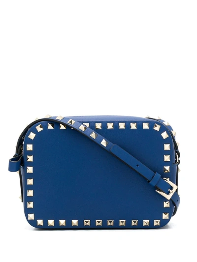 Shop Valentino Small Rockstud Crossbody Bag In Blue