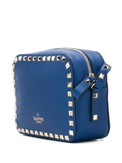 Shop Valentino Small Rockstud Crossbody Bag In Blue