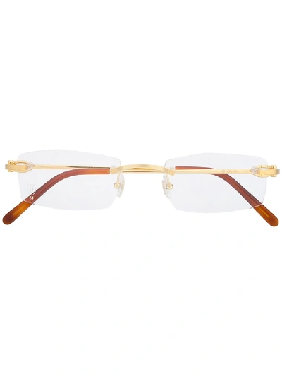 Shop Cartier Frameless Rectangular Glasses In Gold
