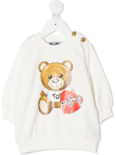Shop Moschino Long-sleeved Logo Print Jumper In White